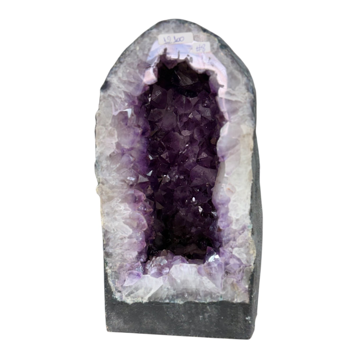 Natural Amethyst cluster looks like cave.